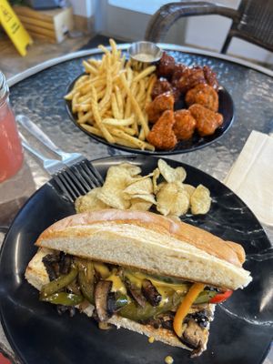 Mushroom cheesesteak and 1/2 & 1/2 cauli wings    at Make It Vegan in Lakewood