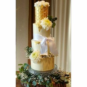 Four tiered wedding cake at Petit Gateau in Victoria