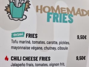 vegan options clearly labeled on menu at Simbiosa in Luxembourg City