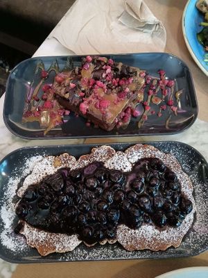 Blueberry pancakes & brownie. at Niki Athens Hotel in Athens