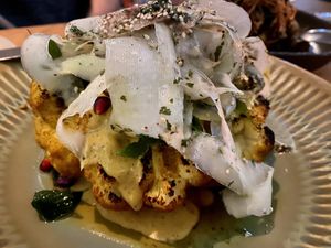 BBQ cauliflower shawarma with labneh mornay, green papaya, and curry leaf oil. Super delicious and the pomegranate seeds topped off the combined flavours perfectly   at ZA ZA TA in Fortitude Valley