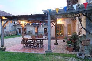 Dine alfresco in our courtyard at Under The Lime Tree in Angouleme