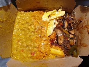 Chickpea curry, mushrooms, macaroni pie and pumpkin. at Eat of Eden in South West London
