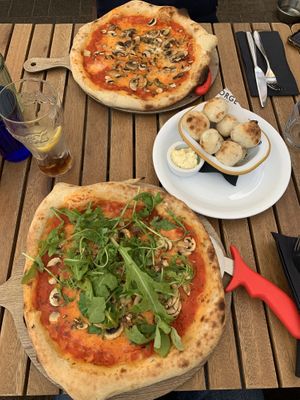 Pizza funghi (top) and Veronese (below) and a portion of cheese dough balls. Mmmm!  at The Old Forge in Hayle