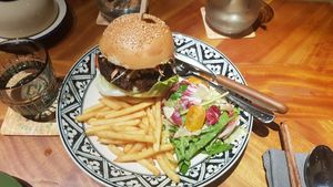 Mushroom Chickpeas Burger with Fries and Salad at Cu Va Re in Ho Chi Minh City