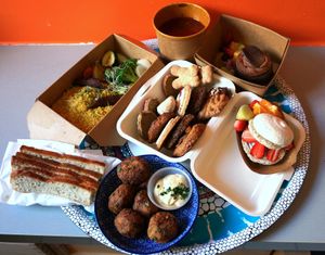 Delivery: Couscous + Soyafels + Cookie box + Macaron + Chocolate Cake + Gluten-free bread at Soya Cantine Bio in Paris