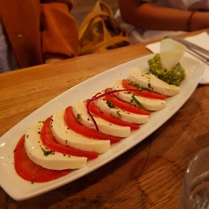 Mozza tomatoes with pesto at Soya Cantine Bio in Paris