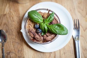 Mousse au chocolat with some silky tofu cream & hazelnut crumble. at Soya Cantine Bio in Paris