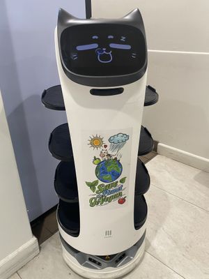 Save the Planet Sticker on Cat Robot for Bringing Food  at House of Fortune in Rowland Heights