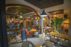 The restaurant is in a gorgeous modernist building with a very eclectic and homy decoration. at MESTIZA in Valencia