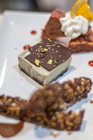 Chocolate nougat with homemade coconut ice cream, Mate cheese cake and Beetroot cake with lemon mousse at MESTIZA in Valencia