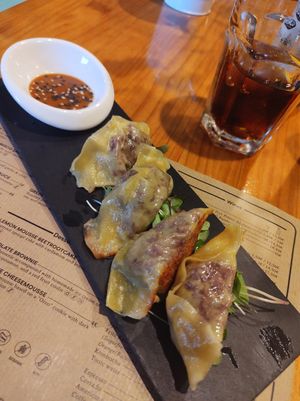 Gyozas. Very interesting (but very tasty!) gyozas.  Peanut sauce was a great addition! at MESTIZA in Valencia