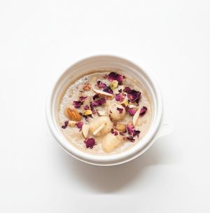 Makhana, nuts, dry fruits cooked in in-house plant-mylk, flavoured with rose and saffron, sweetened with dates and organic jaggery. Allergen - Nuts. Jain-friendly (no roots)
 at Tralata in Mumbai