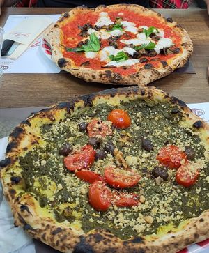 Vegan Pascalina with friarielli pesto, and Siiciliana with fried aubergine and vegan mozzarella at Pizzeria Errico Porzio in Naples