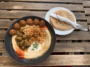 Complete Hummus plate with pita bread  at Hummus Bar - Bartok in Budapest