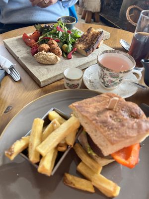 Background: the “Dun•Vegan Board” with falafel, excellent hummus, baby-greens, pickled eggplant 🤤  at The Dunvegan in Isle Of Skye