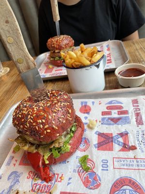 Beyond burger with beetroot brioche bun. Classic fries and Korean bbq dip   at BrewDog - Canary Wharf in East London