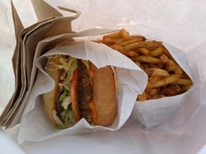 Vegan cheeseburger and fries at Burger Crush in Victoria