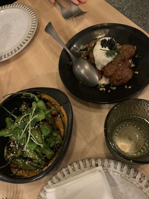 Shishito peppers and lentil hummus; Yukon gold potatoes with hearts of palm crema at Bloom in Chicago
