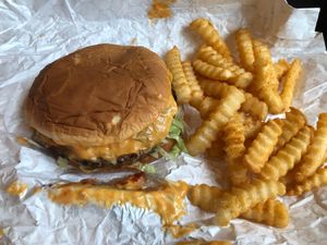 Fabulously delicious Fussy Hussy prepared to perfection along with perfectly seasoned and crispy crinkle fries  at Slutty Vegan - Edgewood in Atlanta