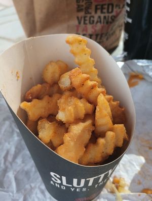 All burgers come with seasoned fries. at Slutty Vegan - Edgewood in Atlanta