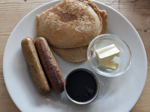 Pancakes and sausage at Hundred Monkeys Cafe in Glastonbury