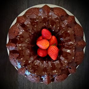 Glazed Chocolate Martini is perfect for any occasion.  It is made with Godiva Dark Chocolate liqueur, Vodka, chocolate chips and covered with chocolate. at Cocktail Cakes in Miami