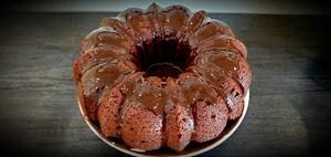 The perfect-for-every-occasion Chocolate Martini is better than ever with chocolate glaze.  It's made with Godiva Chocolate Liqueur, Vodka and filled with mini dark chocolate chips at Cocktail Cakes in Miami