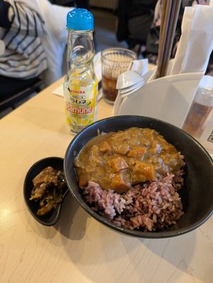 Vegan curry, mushroom pickle, Yuzu Ramune at Musoshin Ramen in Toronto
