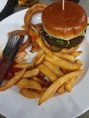 Falafel burger with fries and onion rings at Original Burger in Gdansk