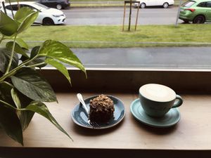Plant-based cake and specialty coffee at Muzz Bistro in Brasov
