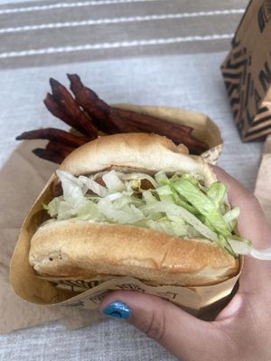 Ordered the 🌱 Buffalo Ranch Chick’n (again) SO GOOD, my  sweet potato fries were a LITTLE too crispy (burnt) for me. Recommend the Strawberry 🍓 Milkshake 💕😛  at Nice Burger - Santa Ana in Santa Ana