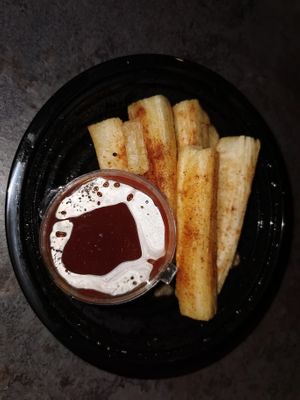 Seasoned Cassava Fries & Banana dip: Caribbean flavoured Cassava fries accompanied with spicy banana sauce at Yooow Vegan in South East London