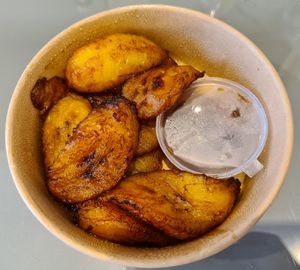 Plantain with bean sauce at Yooow Vegan in South East London