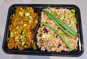 Vegan curry goat rice and peas at Yooow Vegan in South East London