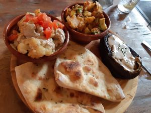 Special starter with potato salad, roasted aubergine and cauliflower at Santa y Pura in Madrid