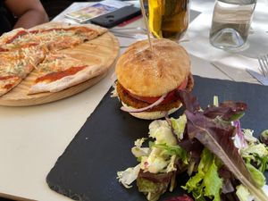 The soy-based burger was great but the salad consisted of lettuce without anything on it at Santa y Pura in Madrid