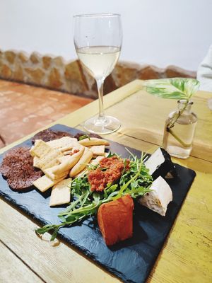 Vegan chorizo and three kinds of cheese at Santa y Pura in Madrid