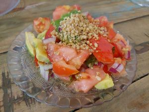 Avocado and tomato salad at Santa y Pura in Madrid