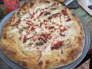 Pizza carbonara at Santa y Pura in Madrid