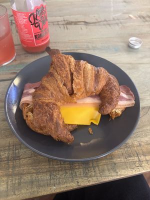 Croassant with vegan bacon and cheese  at Santa y Pura in Madrid