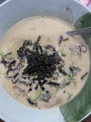 Acorn sujebi in a perilla seed broth. Also contains potato, seaweed, spring onion, courgette, and green chilli that gives the stew a bit of a kick!  at Nanulteo - 나눌터 in Suncheon