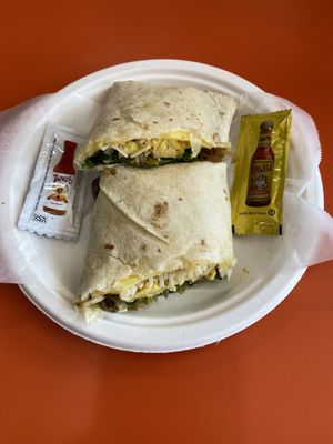 Breakfast quesadilla with just egg, provolone, mushrooms, onions and spinach at Cosmic Vinyl in Los Angeles