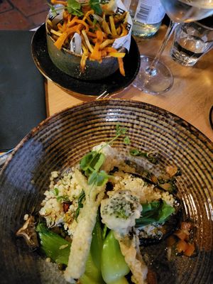 Super lekkere plantaardige opties. Gevulde aubergine met parel couscous en tempura bimi at De Ridderhof in Maassluis