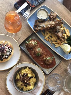 Fish and chips, butternut squash arancini with tomato sauce, beans tostada, Mac and cheese with tempeh bacon at Harp & Crown in Corsham