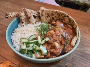 Massaman Curry: Sweet potato, tofu, pineapple and peanuts in a spicy & rich coconut sauce served with cucumber salad, rice & chapatti at Harp & Crown in Corsham