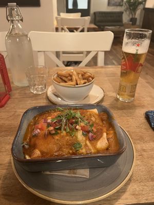 Enchilada with side of chips  at Harp & Crown in Corsham