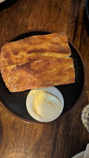 Focaccia w/miso butter and garlic $10.00 at The Sunshine Inn in Redfern