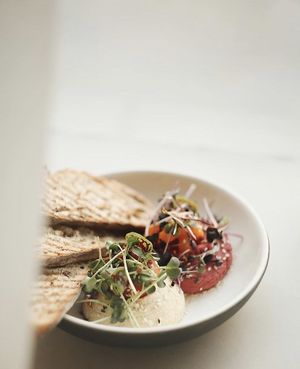 Vegan hummus with bread from breakfast menu. Photo by Angelcakes. at Angel Cakes in Krasnodar