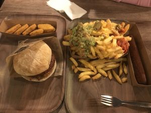 Black mamba loaded fries, veggie frikandel, vegan kippets and vegan Bicky burger    at Friterie Chasse Patat in Ghent